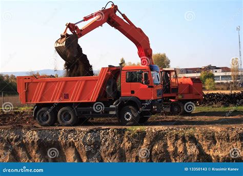 Image result for Large Excavators Loading Trucks