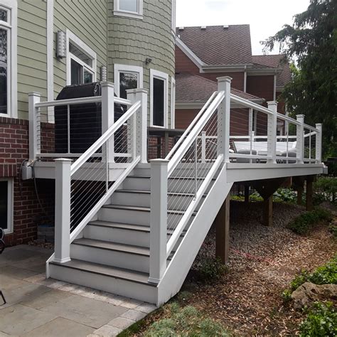 Silver Maple TimberTech Deck with white rails & horizontal cables in ...