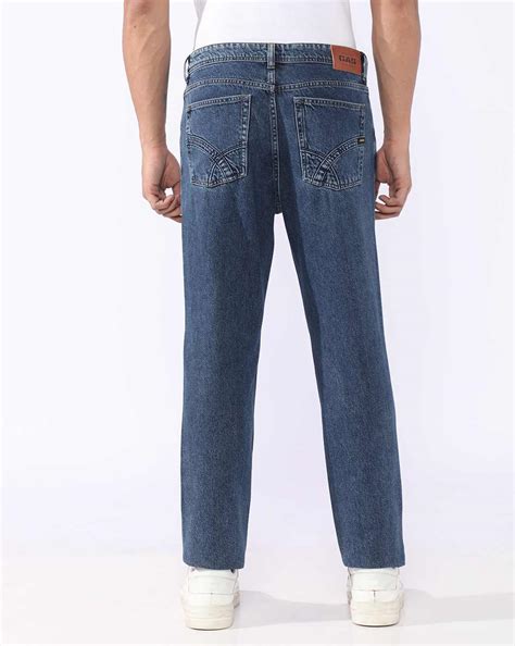 Nico Tapered Fit Mid Rise Light Wash Blue Jeans