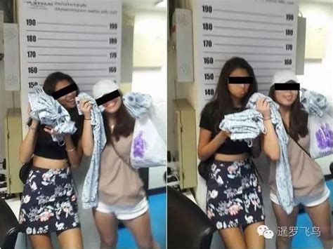 2新加坡女孩曼谷偷衣服被抓后恬不知耻玩拍照