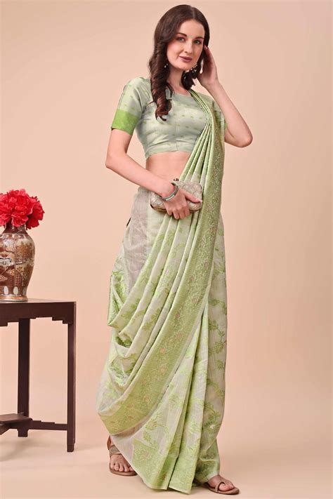 Light Green Floral Zari Woven Cotton Blend Saree With Delicate Tassel