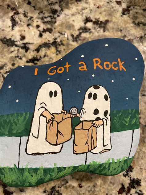 Charlie Brown Halloween | Painted rocks diy, Cute pumpkin carving, I ...