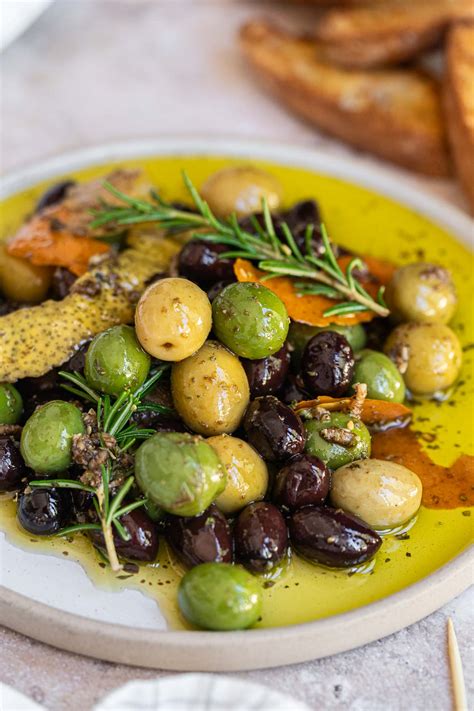 Mediterranean Marinated Olives - Six Hungry Feet