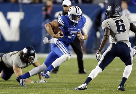 BYU quarterback Taysom Hill fractures left leg against Utah State ...