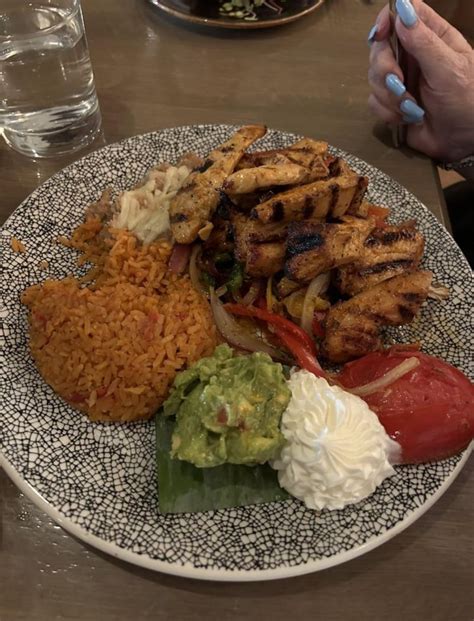 Calories in chicken fajitas with the sides too - Dining and Cooking
