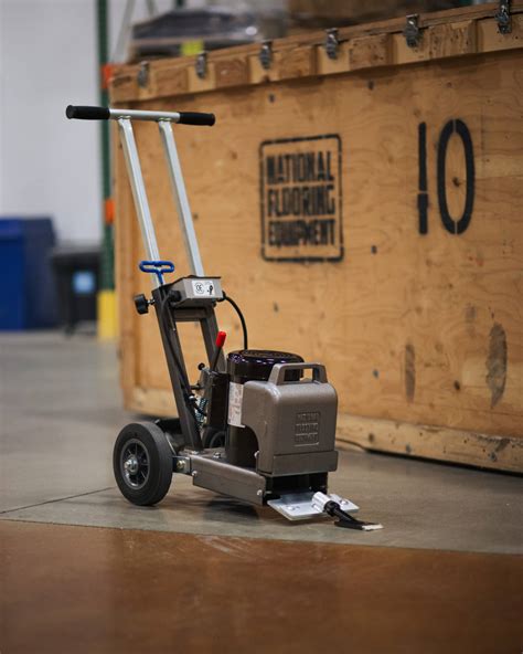 Ceramic tile removal with a scraper - National Flooring Equipment