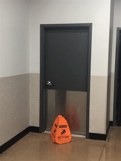 Apparently two guys got caught having sex in the family restroom. No wonder there’s a wet floor ...