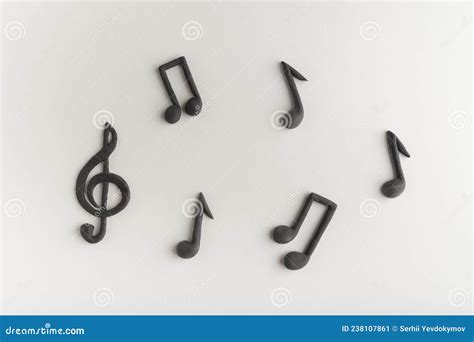 Black Treble Clef And Music Notes On Golden Background. Violin Key. Key Of G. Music Symbol ...