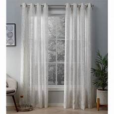 White And Gold Curtains by Woodland Winter White Gold Printed Metallic Branch Sheer White And Gold Curtains