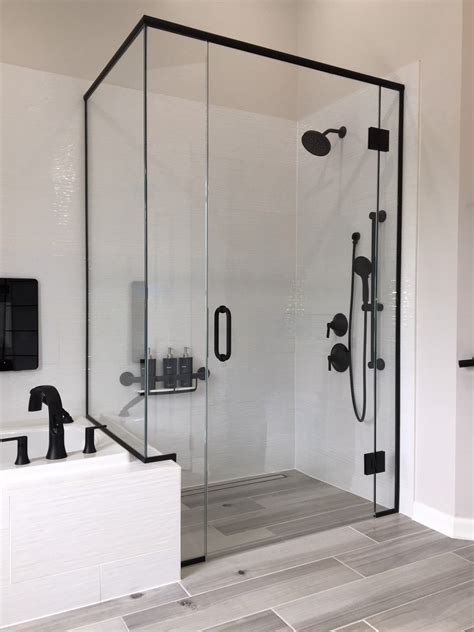 Custom Frameless Glass Shower Enclosure with Matte Black Finish