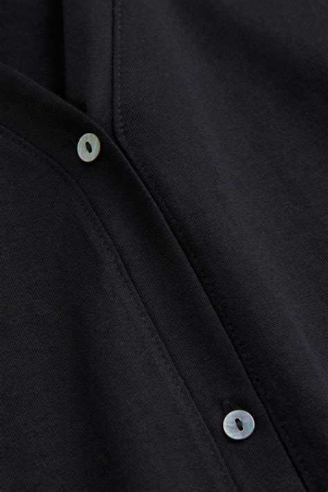 H&M+ Button-front jersey dress - Black - Ladies | H&M IN