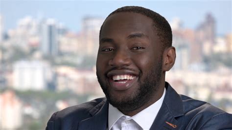 Black Man in Business Suit 的图像结果