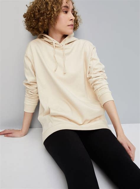 Buy Women Solid Hooded Sweatshirt Online at just Rs. 899.0 ...