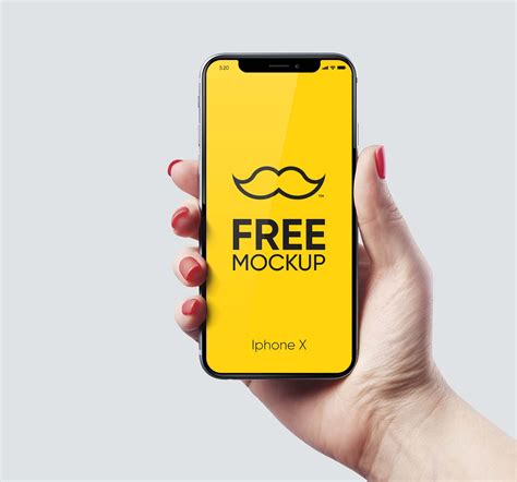 Free iPhone X Held by Hand Mockup (PSD)