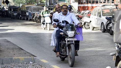 Karnataka bans pillion riders on two-wheelers with engine smaller than ...