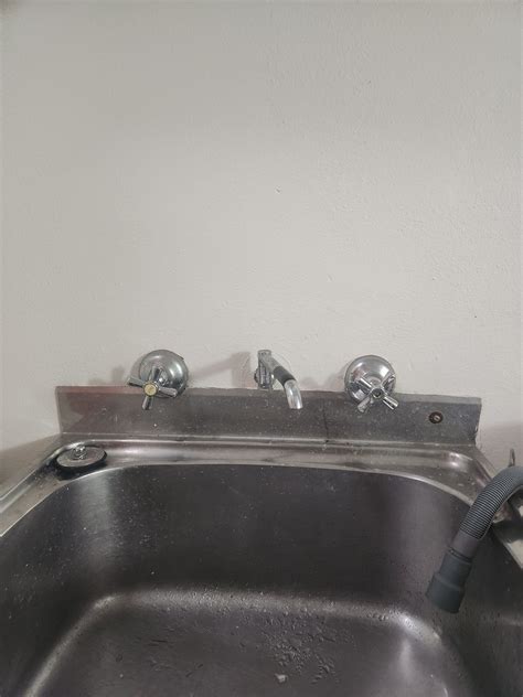 Image result for How to Fit Washing Machine Taps Over New Tiling