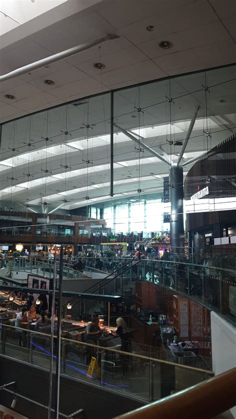 What is the purpose of the glass coming down from the ceiling? Is it to ...