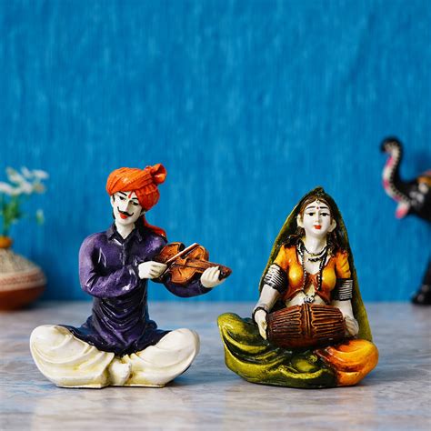 Colorful Combo of Rajasthani Craftsmen and Lady Playing a Musical Inst ...
