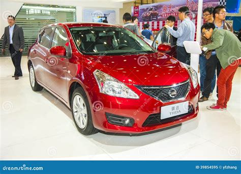Red nissan tiida car editorial image. Image of auto, limousine - 39854595