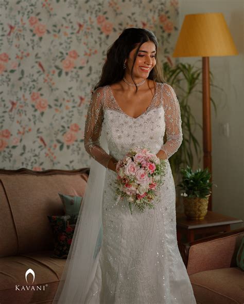 Signature bridal mermaid gown with hand work over the embellished lace ...