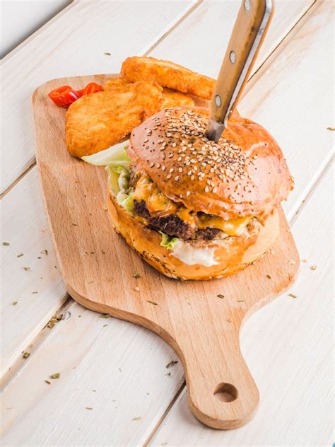 Burger with pretzel bun Images - Free Download on Freepik