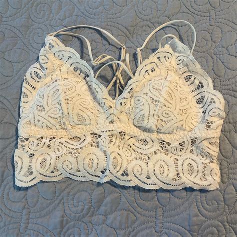 White lace bralette, pads included, lightly worn,... - Depop