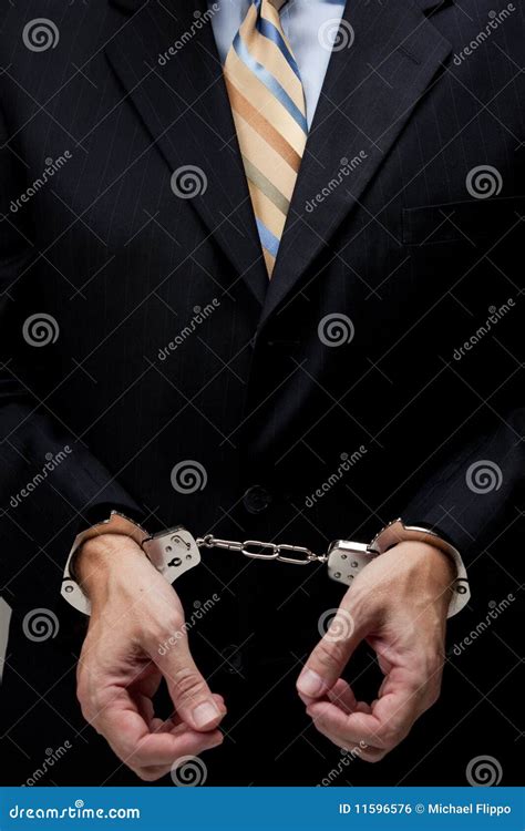 Business man in handcuffs stock photo. Image of jail - 11596576