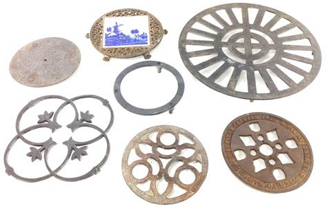 Lot - (7) Antique Cast Iron Stove Iron Trivets