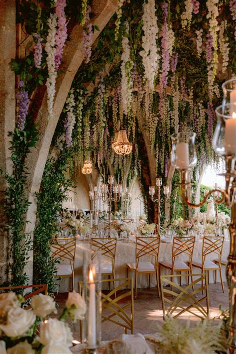 An Ethereal Wedding Reception Decor ft arch ceiling filled w/ floral ...