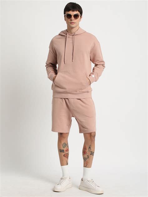 Shop Men Pink Solid Relaxed Fit Hoodie Online – bearhouseindia