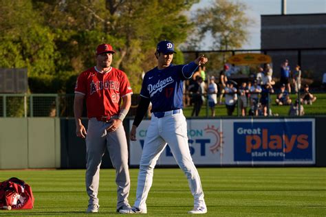 Shohei Ohtani shares smiles with former teammate Mike Trout inside ...