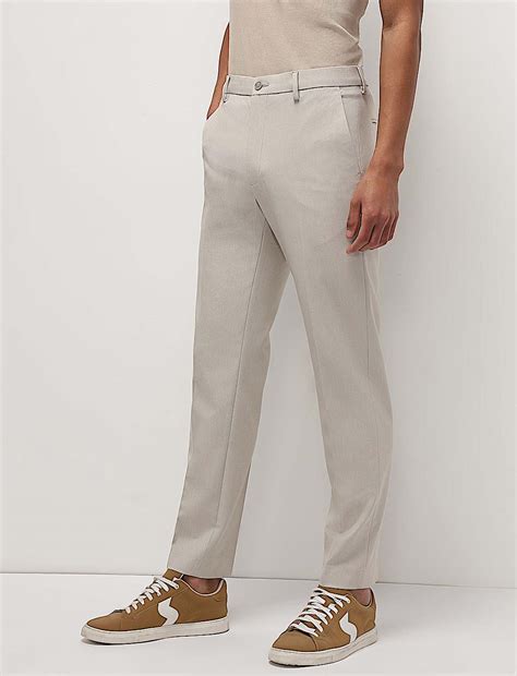 Buy Mid Waist Textured Slim Fit Trousers at Marks & Spencer