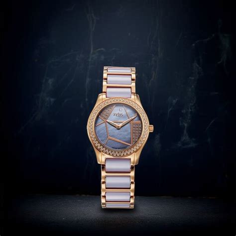 Buy Online Xylys Swiss Analog Shimmer Swiss Steel & Ceramic Mother of ...