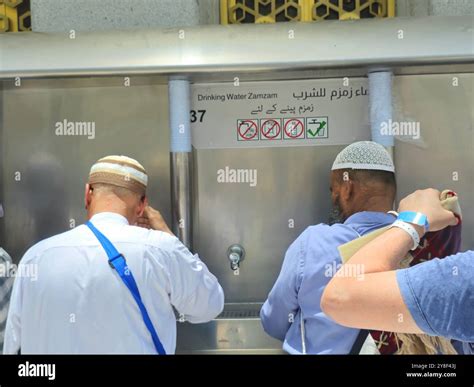 Mecca, Saudi Arabia, June 9 2024: pilgrims drinking from Zamzam well, the well is a miraculously ... - how deep is zamzam well
