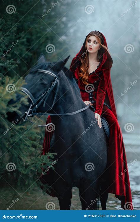 Medieval Woman Princess in Red Dress Sits Astride Black Steed Horse ...