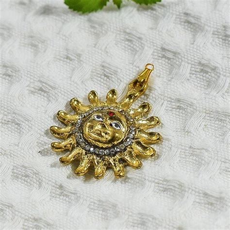 Buy Dazzling Diamond Studded Surya Pendant Online in India - Mypoojabox.in