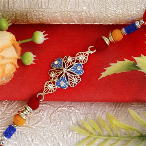 Send German Silver Floral Rakhi Online | Rakhibazaar.com