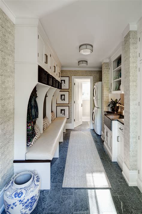 Mud room turned laundry room! Love the use of wallpaper in this space ...