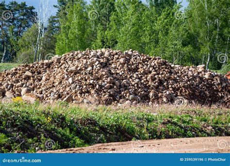 Pile of Boulders in a Sand and Gravel Pit Stock Photo - Image of pile ...