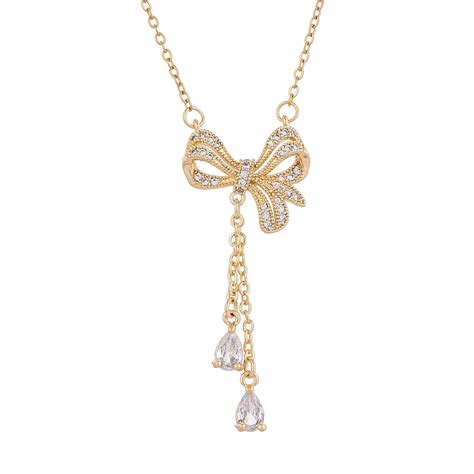 Scintillating Bow Charm Gold Plated Necklace – VOYLLA