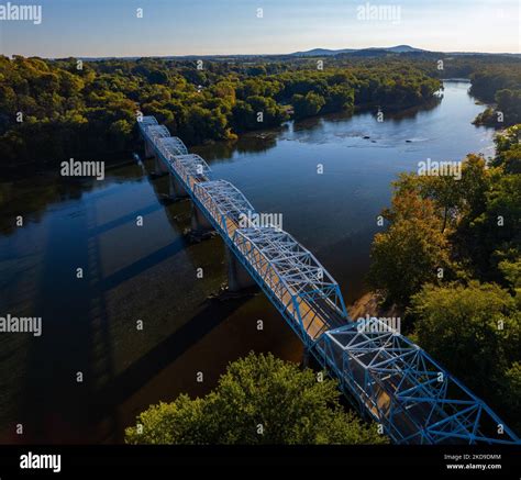 An aerial view of the Point of Rocks bridge over Seneca Lake at sunrise ...
