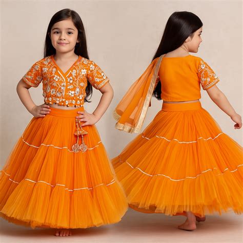 Front Open Embroidered Orange Top And Tiered Net Lehenga With Fringes ...