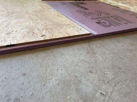 The floor is insulated using 1" rigid foam insulation with two layers ...