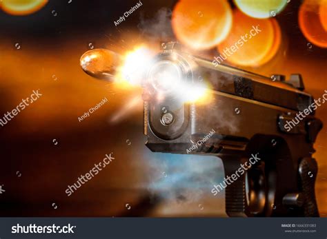 Image result for Bullet Shell Coming Out of a Gun
