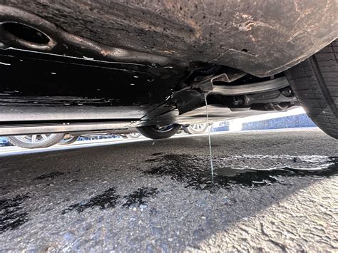 Car Leaking Blue Fluid