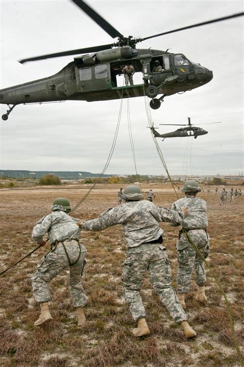 Fort Hood Air Assault School conducts rappel testing out of UH-60 Black ...