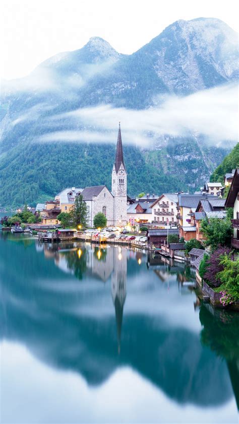 Download wallpaper 1350x2400 chapel, buildings, lake, mountains, clouds ...