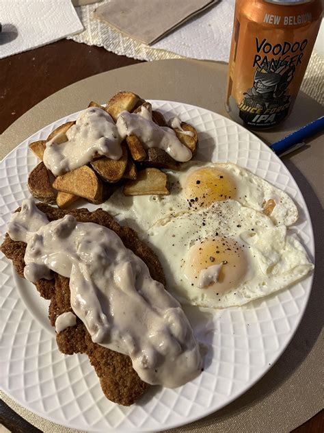 Frozen country fried steak, canned sausage gravy, eggs and potatoes for ...