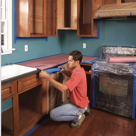 How to Spray Paint Kitchen Cabinets (DIY) | Family Handyman