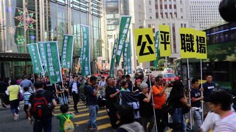 香港劳工团体游行抗议中共废除集体谈判权 — 普通话主页